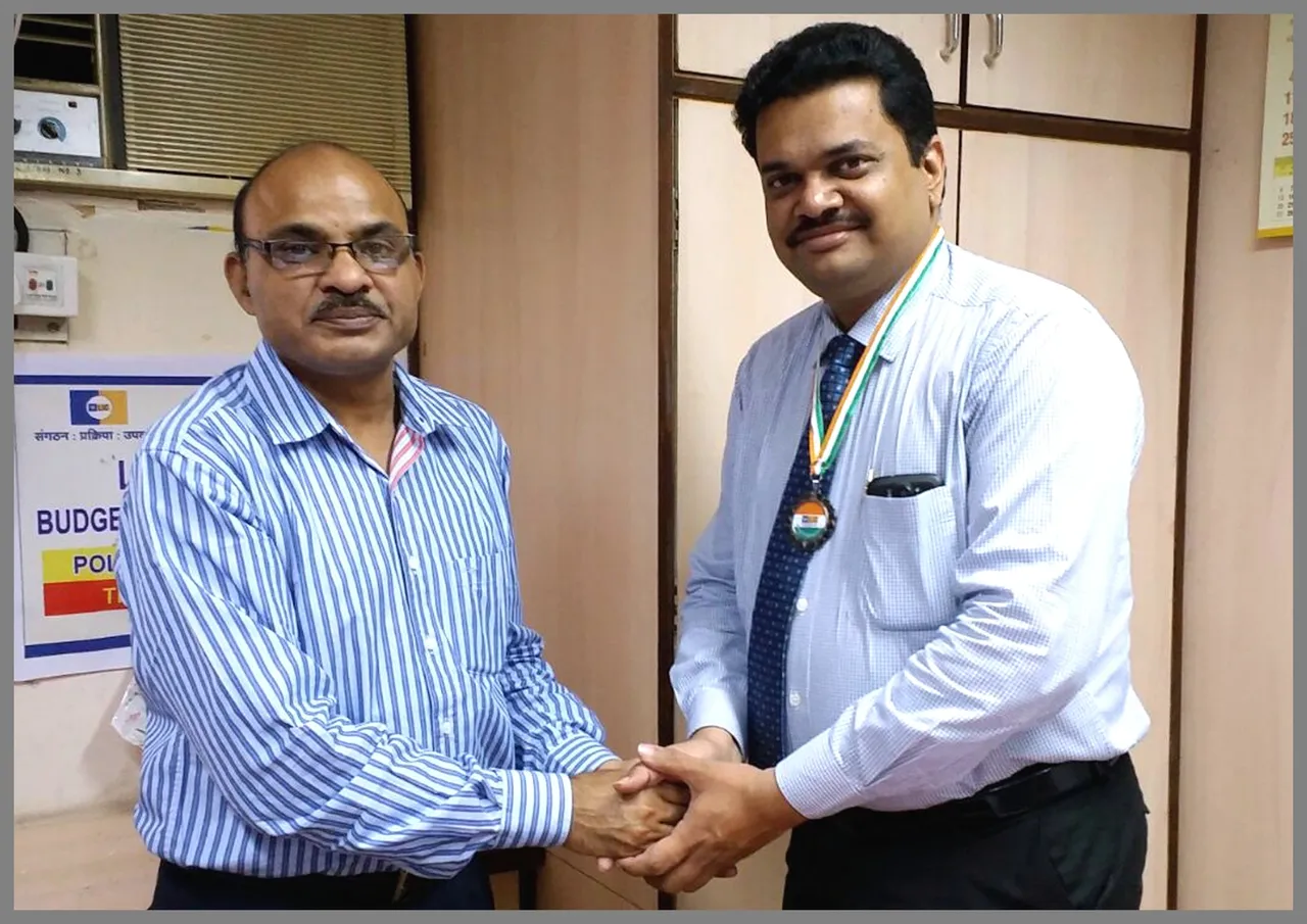 Felicitated by Chief Manager - LIC